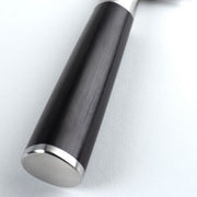 Close-up of the Shun Classic Kiritsuke 8-inch knife's polished metal handle end, showcasing its craftsmanship and versatility, ideal for diverse culinary tasks.