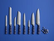 Wüsthof Classic 8-Piece Designer Knife Block Set featuring close-ups of knives, ideal for culinary precision, showcased among blue decorative balls.