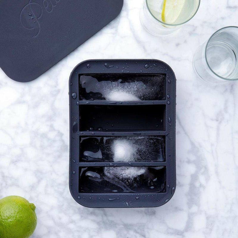 W&P | Peak Reusable Silicone Ice Trays - Charcoal - Collins Cocktail; makes 12 large ice cubes, features sturdy silicone frame for easy removal and filling.