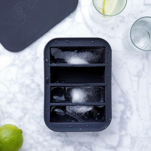 W&P | Peak Reusable Silicone Ice Trays - Charcoal - Collins Cocktail; makes 12 large ice cubes, features sturdy silicone frame for easy removal and filling.
