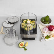 Cuisinart | Custom 14 Cup Food Processor with avocado and vegetables in bowl, showcasing its large capacity and versatility for efficient food preparation.