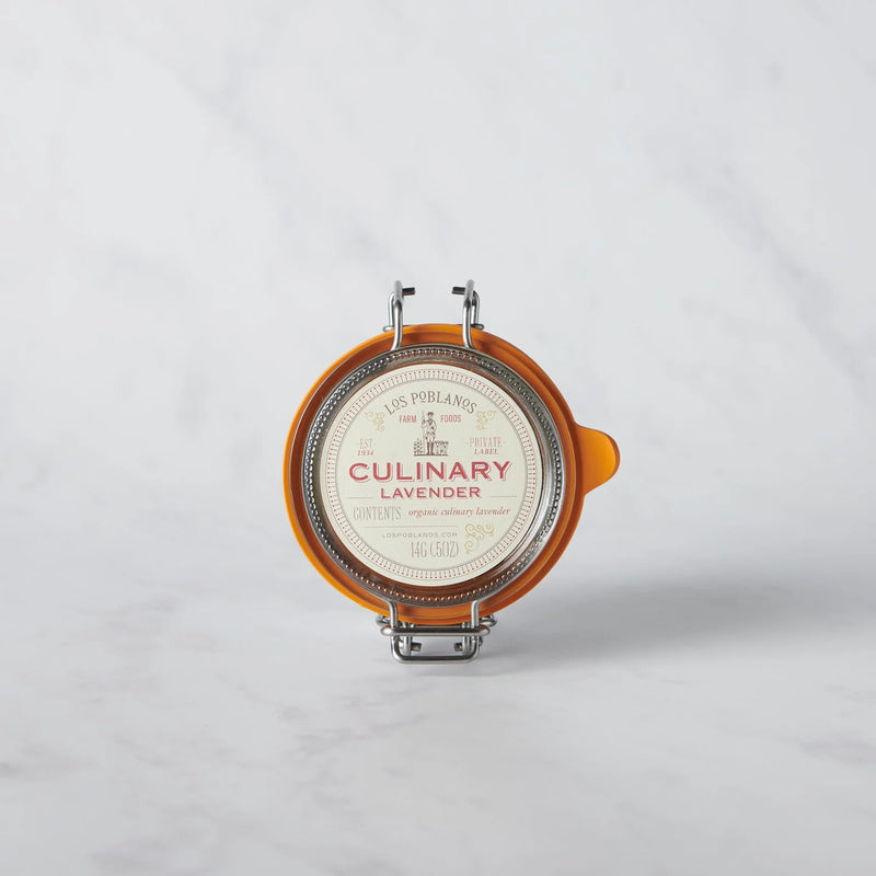 Los Poblanos | Culinary Lavender in a glass clamp-top jar, ideal for enhancing recipes with organic, hand-harvested lavender buds from New Mexico.
