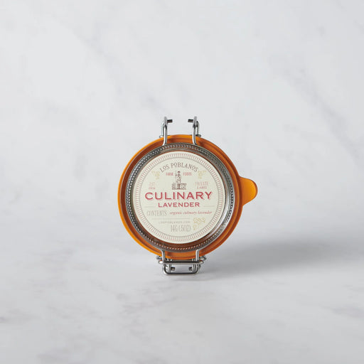 Los Poblanos | Culinary Lavender in a glass clamp-top jar, ideal for enhancing recipes with organic, hand-harvested lavender buds from New Mexico.