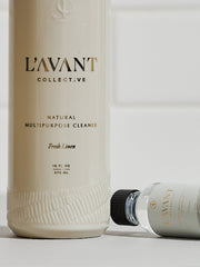 L'AVANT Collective - Fresh Linen Multipurpose Cleaner Refill in a sleek white glass bottle, ideal for eco-friendly cleaning solutions, enhancing sustainability in your kitchen routine.