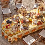 Caravan Home - Pumpkin Orange & Mustard Tablecloth: 71 x 71 on an autumn-themed dining setup with pumpkins, glassware, and rustic accents for a cozy outdoor meal.
