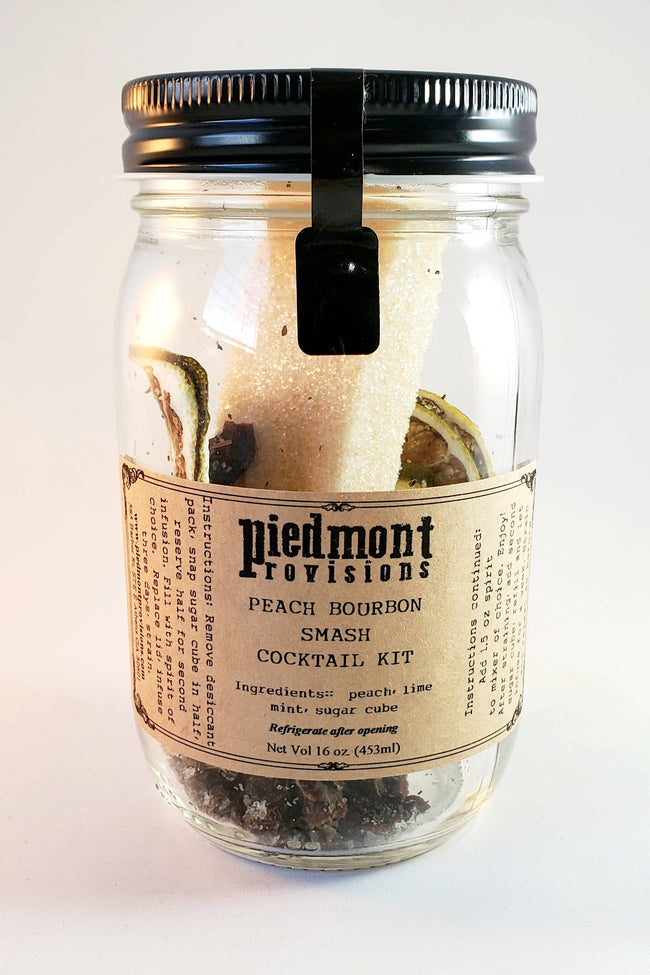 Piedmont Provisions | Cocktail Infusion Kits - Bourbon Peach Smash displayed with its mason jar for crafting flavorful cocktails. Ideal for enhancing your home bar experience.