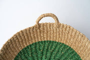 NEEPA HUT - Iris Tray I Yellow: A handwoven seagrass tray with a yellow circle design, ideal for serving or organizing, reflecting artisanal craftsmanship.