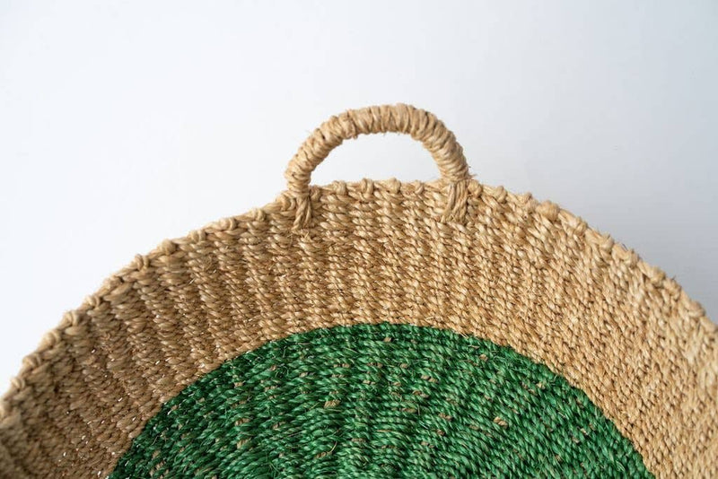 NEEPA HUT - Iris Tray I Yellow: A handwoven seagrass tray with a yellow circle design, ideal for serving or organizing, reflecting artisanal craftsmanship.