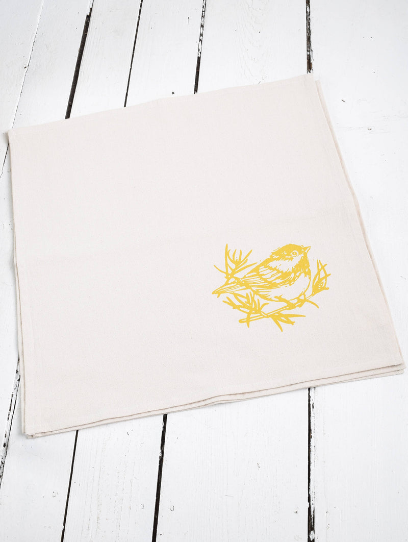 Hearth and Harrow - Set of 4 Organic Cotton Chickadee Cloth Napkins in Yellow, featuring a hand-printed bird design, soft and eco-friendly for versatile kitchen use.