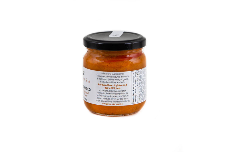 Matiz Romesco 6.5oz jar with black lid, featuring a traditional Catalan sauce made from tomatoes and almonds; ideal for enhancing meats, seafood, and vegetables.