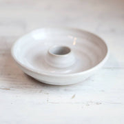 Gravesco Pottery - Palo Santo Burning Ritual Dish: Black, a white-glazed ceramic dish with a central holder for upright wood, displayed on a wooden surface, ideal for mindful rituals.