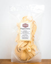 Nicola's Marketplace - Pappardelle: Fresh, frozen pappardelle pasta in a resealable pouch, featuring premium ingredients from local farmers, ideal for quick Italian meals.