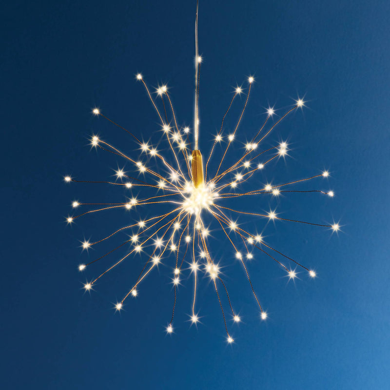 Napa Home & Garden - Napa Night Sky LED Starburst Lights Small, showcasing 120 warm white LEDs in a striking starburst design against a nighttime sky.