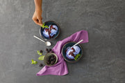 Zwiesel Fortessa | Arezzo Flatware Serving Set, Brushed, with silver spoons beside bowls of berry ice cream on a slate surface, showcasing elegance and precision.