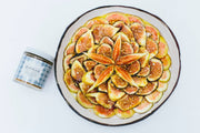 Villa Jerada - Dukkah - 50g: A bowl of figs garnished with dukkah, a coarse Egyptian spice and nut blend, ideal for enhancing dishes.