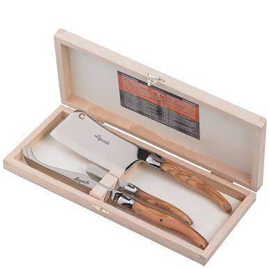 The French Farm - Jean Dubost 3pc Olive Wood Cheese Set in a Clasp Box, featuring a cleaver, cheese knife, and spreader with stainless-steel blades and olive wood handles.