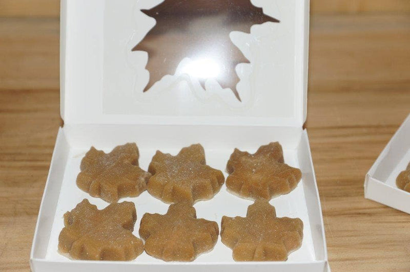 G&W Maple Products - Large box of maple candy featuring six sugar-coated, maple-leaf-shaped confections through a leaf-shaped window in a white box lid.