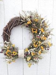 Alissas Flower Farm - Wreath: Sunflowers on Sweet Annie, featuring a grapevine base with dried flowers, including sunflowers and zinnias, elegantly arranged.