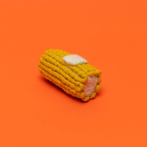 Ware of the Dog - Boiled Wool Corn Dog Toy: A handmade, fair-trade lambswool corn replica, crafted by Nepali artisans, perfect for playful pet engagement.