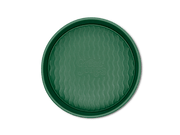 Great Jones | Patty Cake - Broccoli, a round tray with a wavy pattern, designed for easy release and even baking.