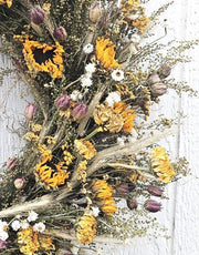 Alissas Flower Farm - Wreath: Sunflowers on Sweet Annie featuring dried sunflowers, zinnias, and purple nigella on a grapevine base, suitable for indoor decor.