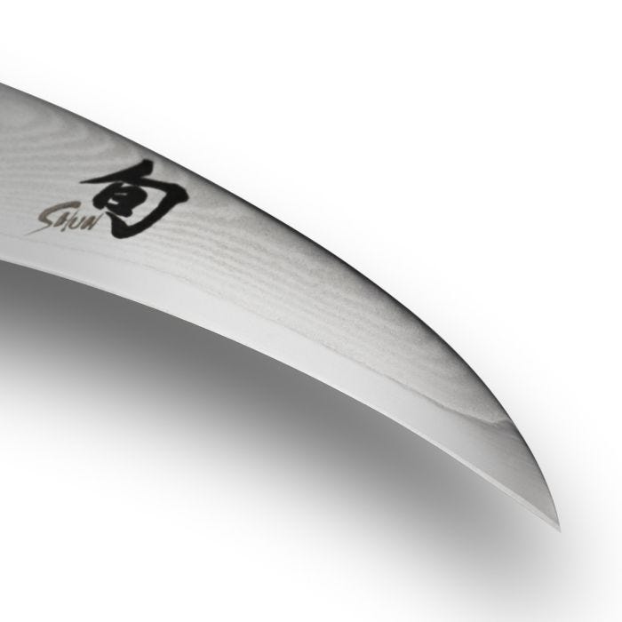 Shun | Classic Bird's Beak Paring, 2.5 inches, showcasing its ultra-thin, razor-sharp Damascus blade with Shun logo, perfect for decorative and precise cuts.