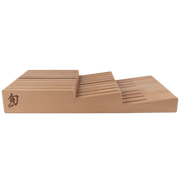 Shun In-Drawer Knife Tray, 15 Slot: Stepped wooden block with multiple slots for organizing up to 14 knives and a honing steel, ideal for efficient drawer storage.