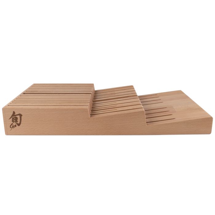 Shun In-Drawer Knife Tray, 15 Slot: Stepped wooden block with multiple slots for organizing up to 14 knives and a honing steel, ideal for efficient drawer storage.