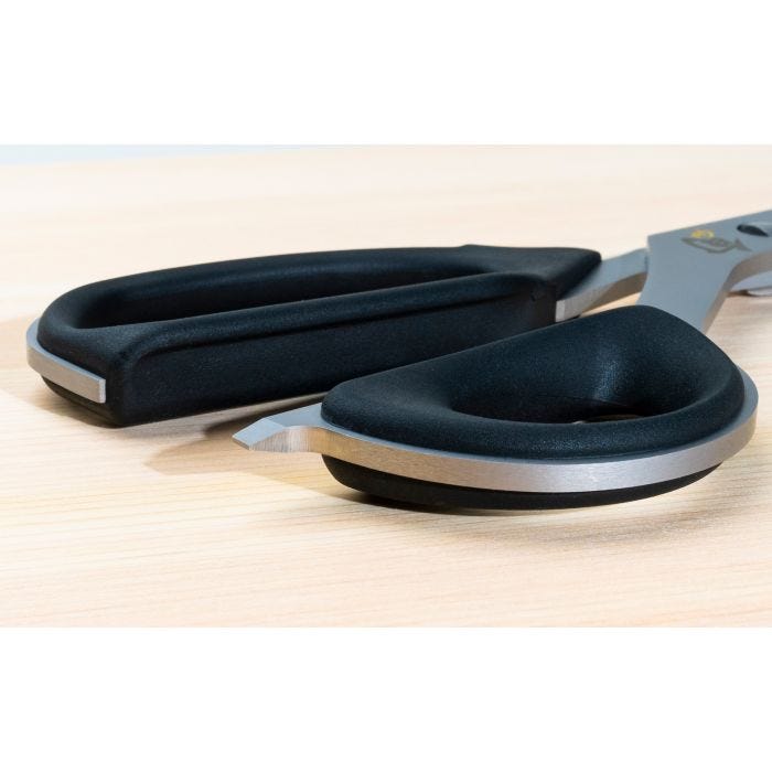 Shun Kitchen Shears, 9 inches, featuring stainless-steel blades and molded handles, ideal for versatile kitchen tasks, displayed on a wooden surface.