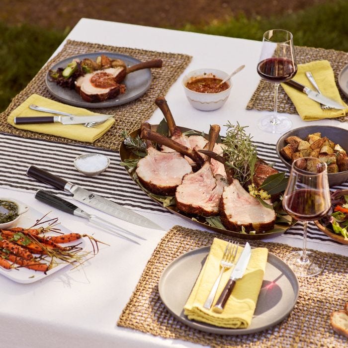 Shun | Classic Carving Set, 2-Piece displayed with an elegant al-fresco dinner, showcasing its precision and style amidst a gourmet meal.