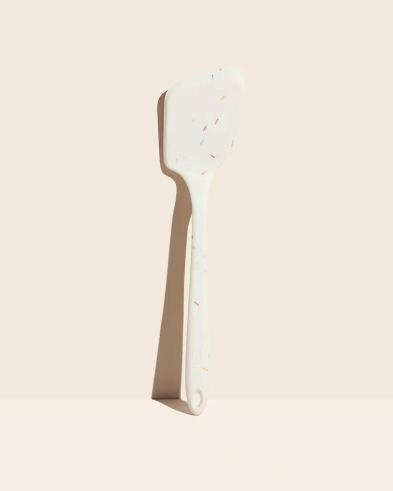 GIR | Mini Flip - Teal: A versatile kitchen spatula with red specks, perfect for flipping small foods like pancakes and burgers, adding charm to any kitchen.