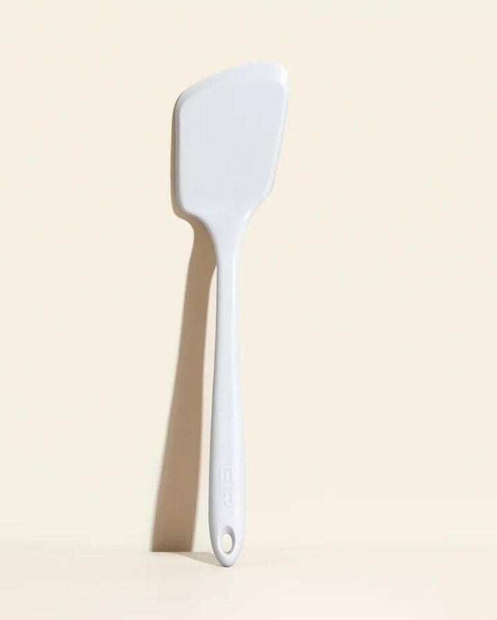 GIR | Mini Flip - Teal, a versatile white spatula ideal for flipping snickerdoodles and sliders, showcased on a simple white surface.