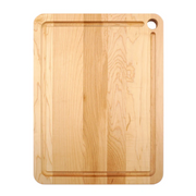 J.K. Adams Maple Prep Cutting Board with Juice Groove, showcasing a wooden surface with a distinctive hole, ideal for kitchen prep.