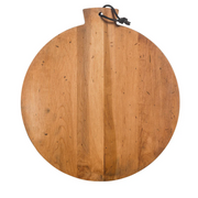J.K. Adams Artisan Maple Round Serving Board with black cord, ideal for gourmet presentations, reflecting Athens Cooks' dedication to quality kitchen tools.