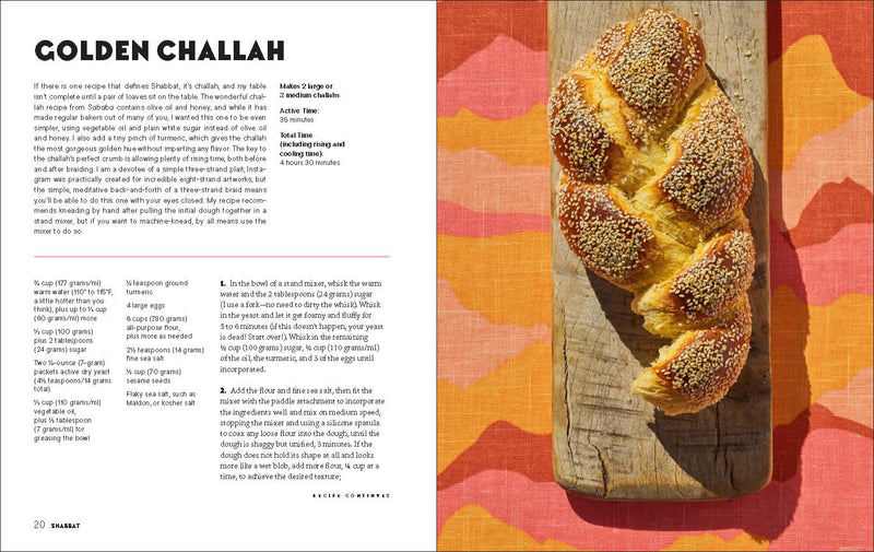 Cookbook spread from Penguin Random House LLC - Shabbat featuring a Golden Challah recipe with a photo of a braided, sesame-seed-topped challah loaf on a wooden board.