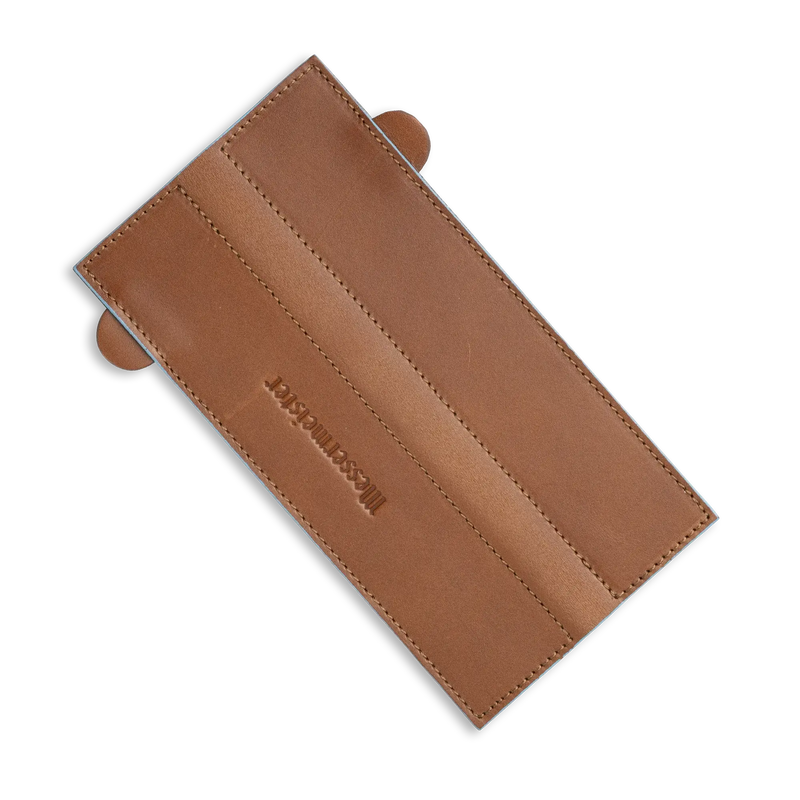 Messermeister - Leather Magnetic Edge-Guard - 8.5: Brown, displayed open, showing two stitched slots, designed for secure knife edge protection with a magnetic closure.