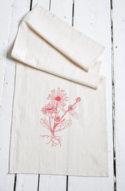 Hearth and Harrow - Organic Cotton Calendula Tea Towel in Red, featuring a red floral design, perfect for kitchen use and fine dining.
