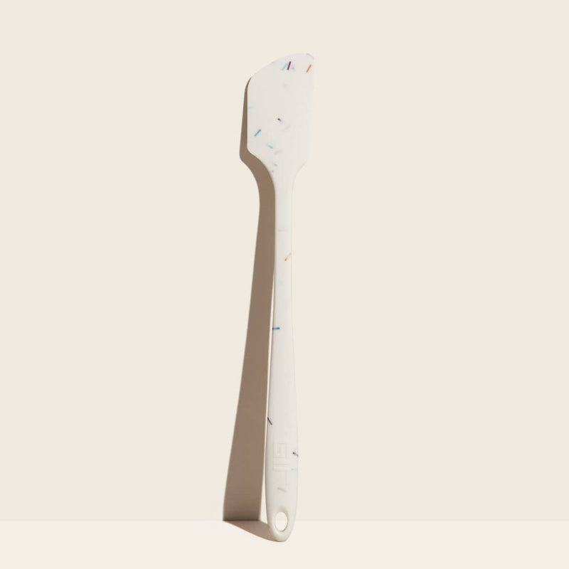 GIR Get It Right - GIR Skinny Spatula: Black, featuring a white blade and multicolored speckled handle, designed for durability and flexibility in kitchen tasks.