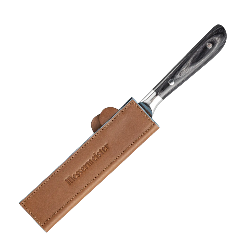 Messermeister - Leather Magnetic Edge-Guard - 6.5: Brown, showcasing a knife partially sheathed in premium leather, with magnetic closure for safe, stylish kitchen storage.