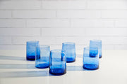 Moroccan Cone Glassware Small - Blue - Set of 6: Hand-blown glasses with visible bubbles, made from recycled bottles, ideal for beverages or as decorative vases.