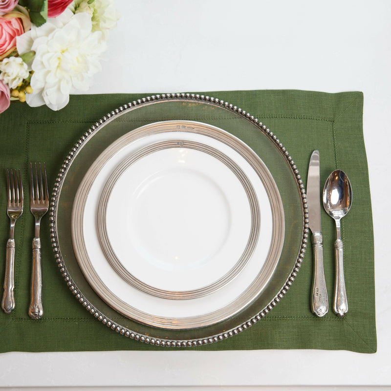 Crown Linen Designs | Hemstitch Placemat - Evergreen: A detailed view of elegant linen placemats featuring a hemstitch border, ideal for enhancing your dining setup with sophistication.