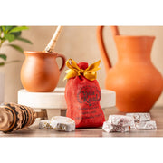 Villa Real Mexican Hot Chocolate Variety Gift Set featuring two clay jugs, highlighting the festive set's artisanal presentation and authentic Mexican origin.