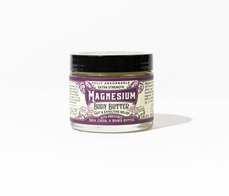 Roots And Leaves - Magnesium Body Butter jar, featuring a close-up of the label, designed for soothing skin application and rapid magnesium absorption.
