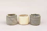NEEPA HUT - Handmade Eco Storage Basket: Beige, intricately woven by Bidayuh artisans, ideal for organizing stationery or holding houseplants, showcasing traditional craftsmanship.