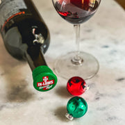 CapaBunga | Holiday Wine Caps - Santa Paws featuring a wine glass and bottle, highlighting festive wine accessory for enhancing entertaining experiences.
