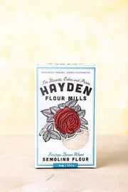 Hayden Flour Mills Semolina Flour box with a red rose design, highlighting its heritage durum wheat, ideal for pasta, biscotti, and cakes.