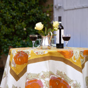 Caravan Home - Pumpkin Orange & Mustard Tablecloths: 71 x 71, features a warm-toned, handprinted floral design, perfect for autumn gatherings with wine and flowers.