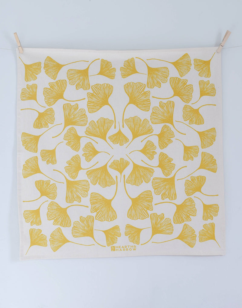 Hearth and Harrow - Ginkgo Leaf Tea Towel - Organic Cotton - Oversized 30 x 30, features yellow ginkgo leaves, eco-friendly print, hanging with clothespins.