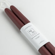 Mo&Co Home - Burgundy Dipped Beeswax Taper Candles, handcrafted, 14 inches, pure beeswax, cotton wicks, bound with a minimalist label, eco-friendly, elegant for dining and decor.