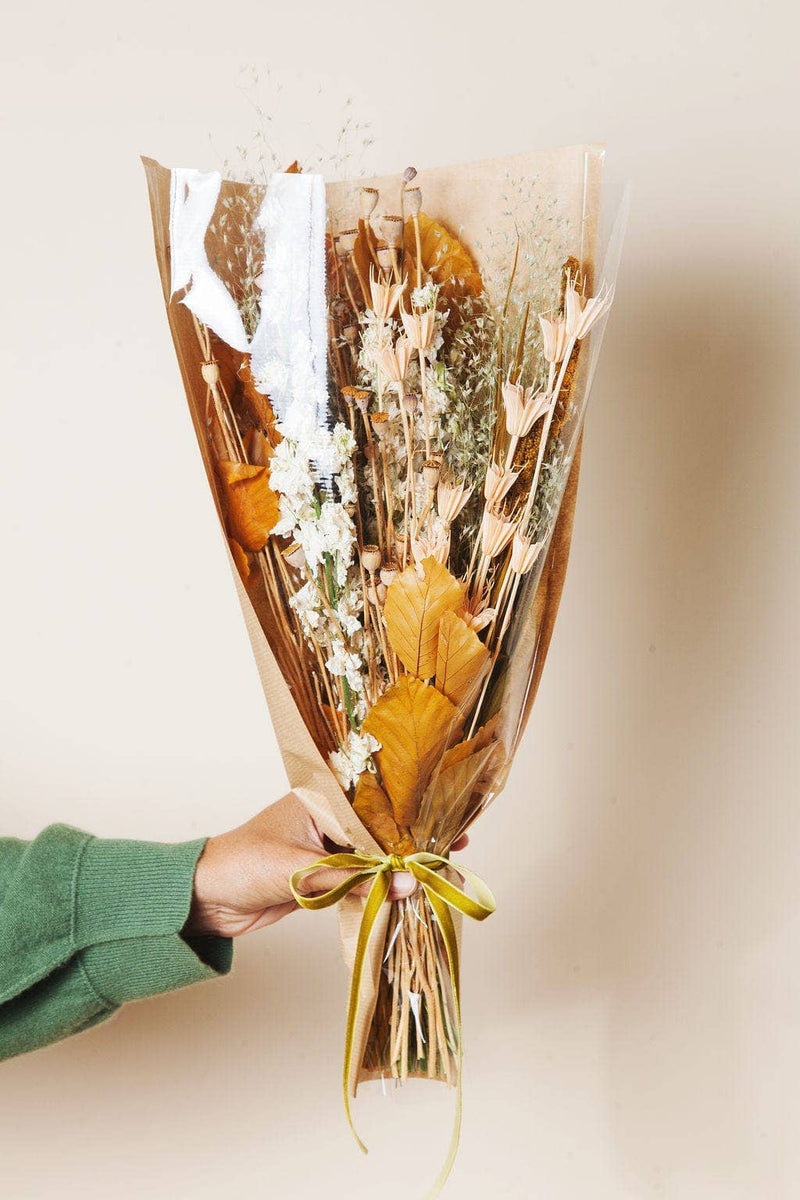 Idlewild Floral Co. - Golden Fall Market Bouquet features dried flowers and grasses in kraft paper, ideal for adding lasting natural beauty to any space.